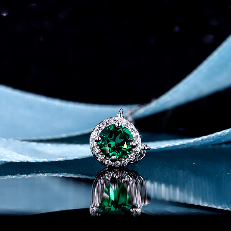 cb4af646 236f 40e8 8f13 cd74881047be 925 Silver Plated 18k White Gold Cultivated Emerald Pendant