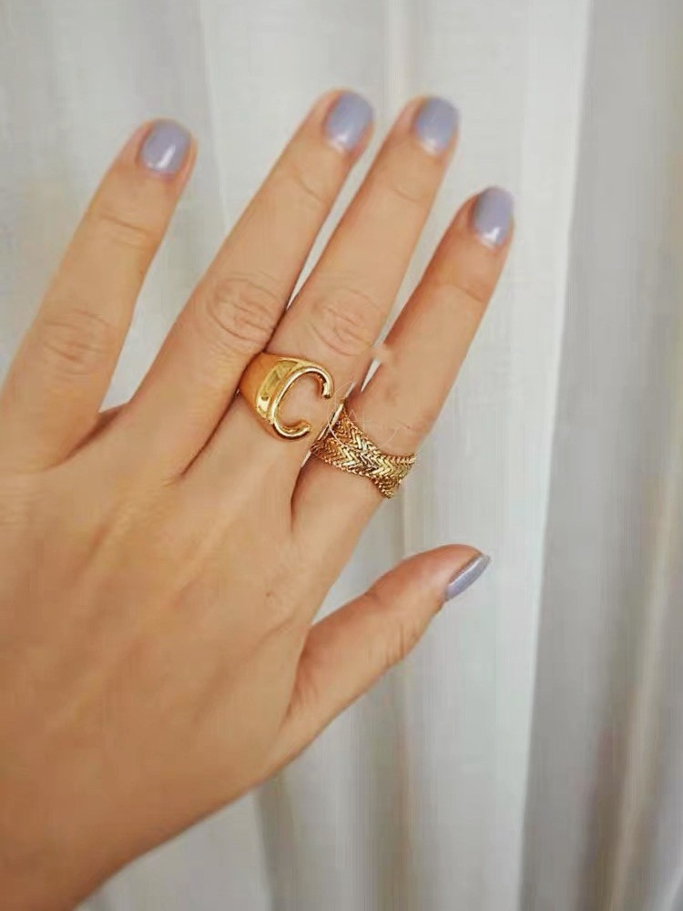 cd1e0d7e 9e83 4225 865b 6d3fc8ea748e Stacked brass snake bone chain ring