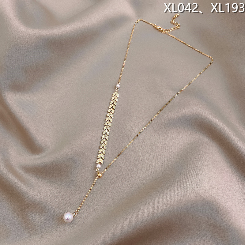 ce56d41f 6c71 487f 8d64 6464f0815c70 Rose Gold Clavicle Necklace Female Bow Knot Zircon Tassel