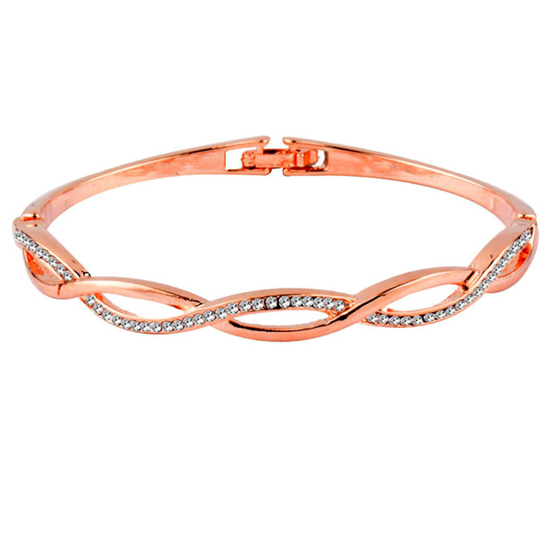 cf602108 1020 4af8 9889 8b8837a8a5ff Japanese And Korean Diamond Wave Cross Hollow Gold Plated Bracelet