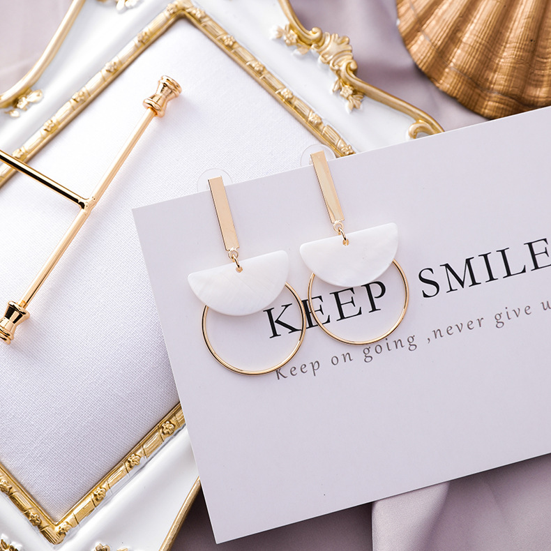 d2ca9bac c411 4ae3 a546 2ffc90fed88e Geometric Ring Square Earrings