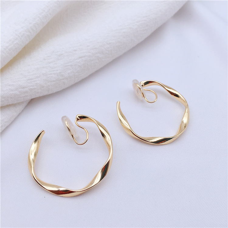 d51ab33f fcb7 41a3 a8b2 c025298b8d85 Mosquito Coil Irregular Metal Earrings Circle Ear Clip Without Hole
