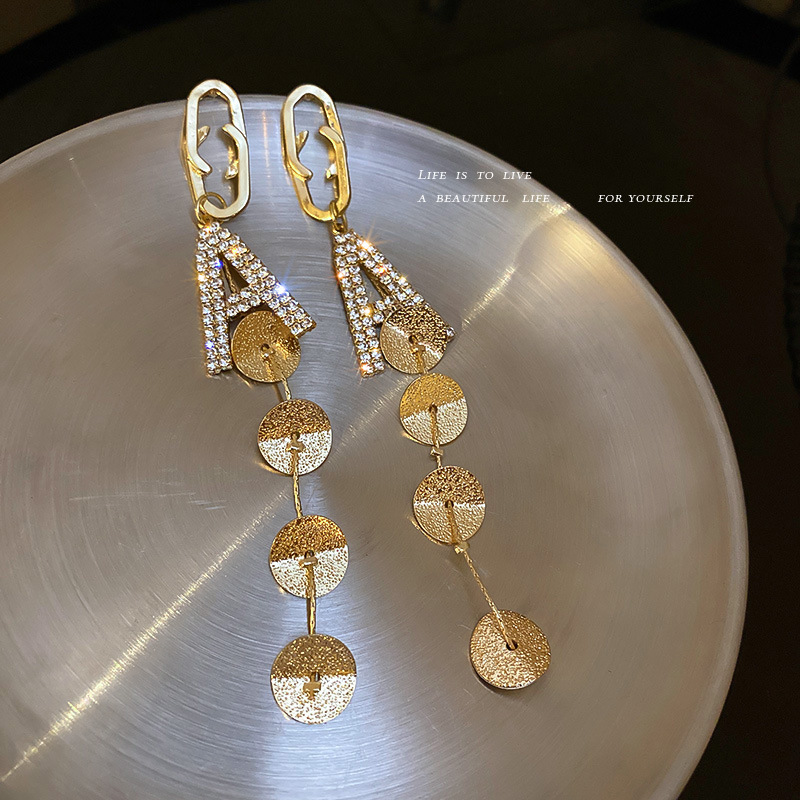 d83eb069 fb16 4fda b460 af6d16583b83 Silver Needle With Diamonds And Geometric Letters Tassel Earrings Long