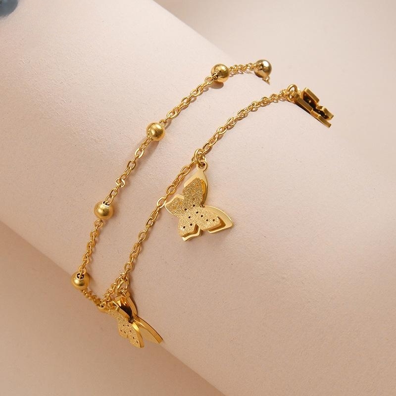 da9b794d 5799 4e8f a339 b186cb791644 Titanium Steel Plated 14K Gold Butterfly Double-layer Room Beads Bracelet Female