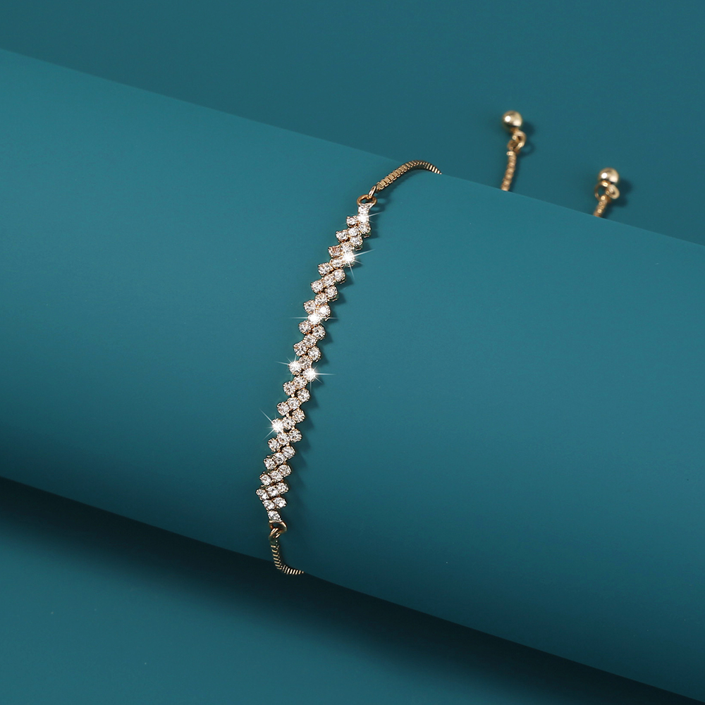 dbdbfe2d db6f 4885 addc 62a67ff2400a Brass Gold Plated Long Micropaved Zircon Pendant Shrink Pulled Brass Bead Bracelet