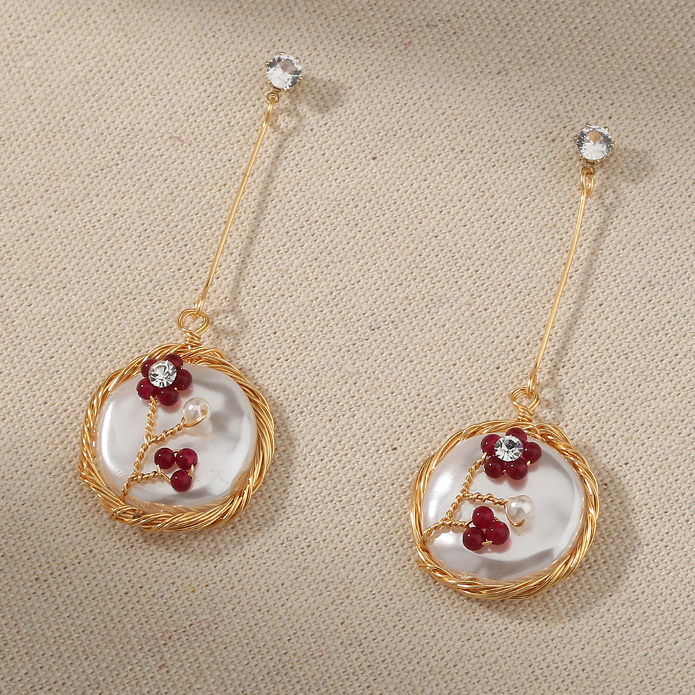 dd219652 2b4f 4333 bf2d 7567488315b5 Hand-wound natural stone flower long Tassel red white earrings