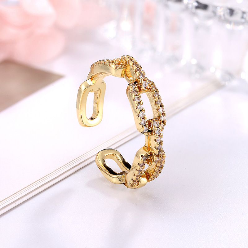 e131bb95 c6a7 4c2a b56c 560868b963ea Zircon Chains Encrusted Gold Ladies' Rings