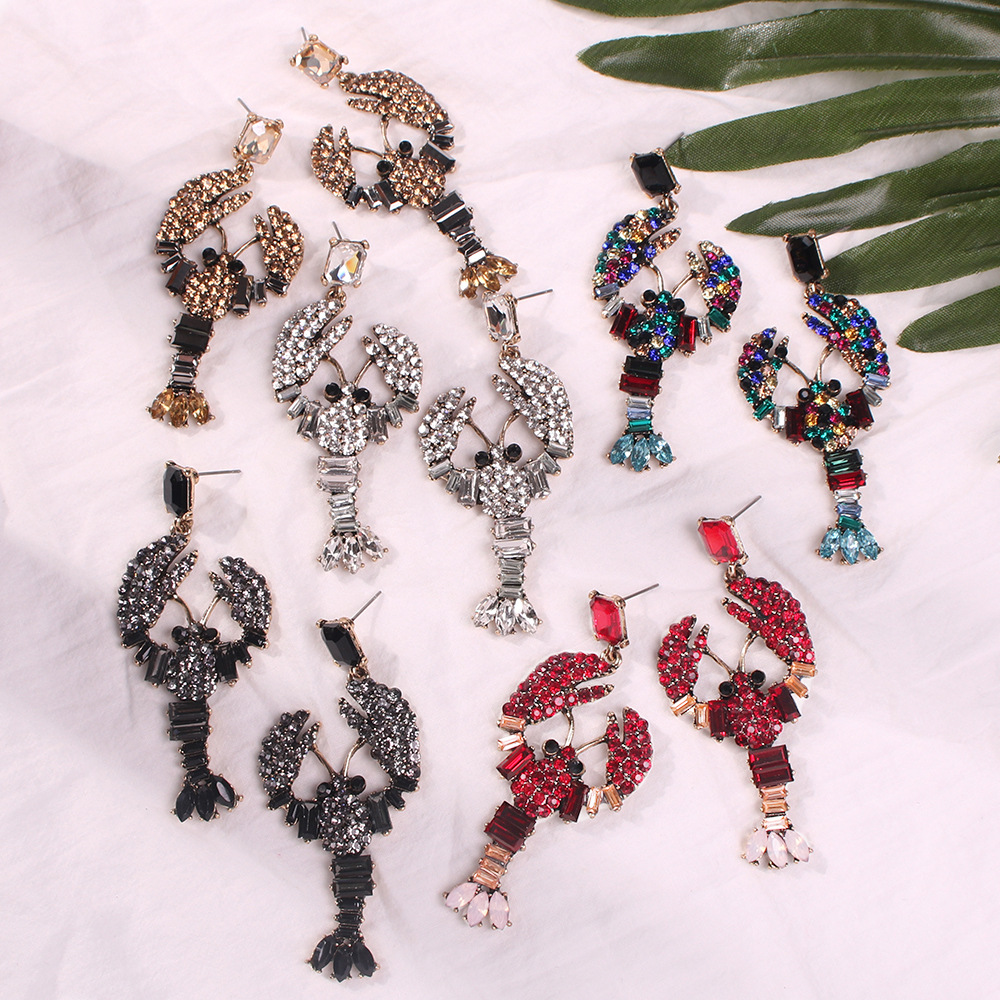 e756c434 ddca 494a 8cfd 2f4bc28637db Lobster Stud Earrings Color Diamond Earrings