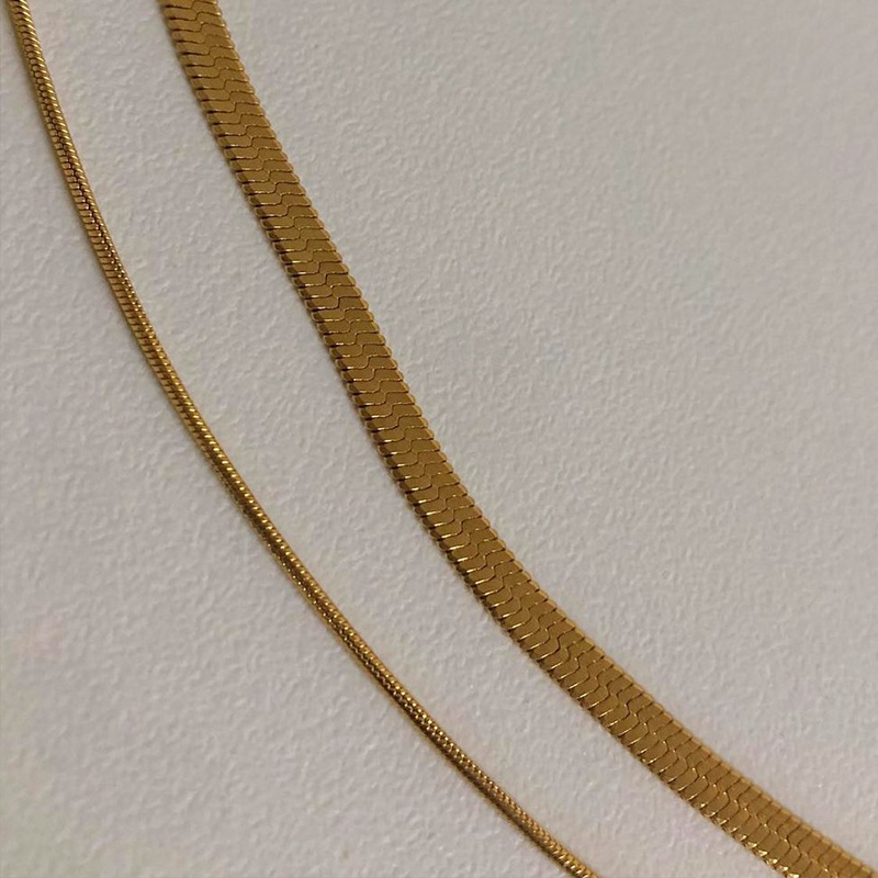 eaa5b632 367f 4a4a 85f8 99d885b553e6 Double-layer And Three-layer Cold Wind Wide, Flat And Thin Folded Snake Bone Necklace Does Not Fade