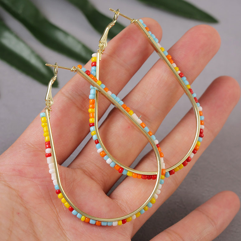 eecb600a dfa5 4420 9684 78bd0cfa5e32 Geometric Handmade Rice Beads Heart Earrings