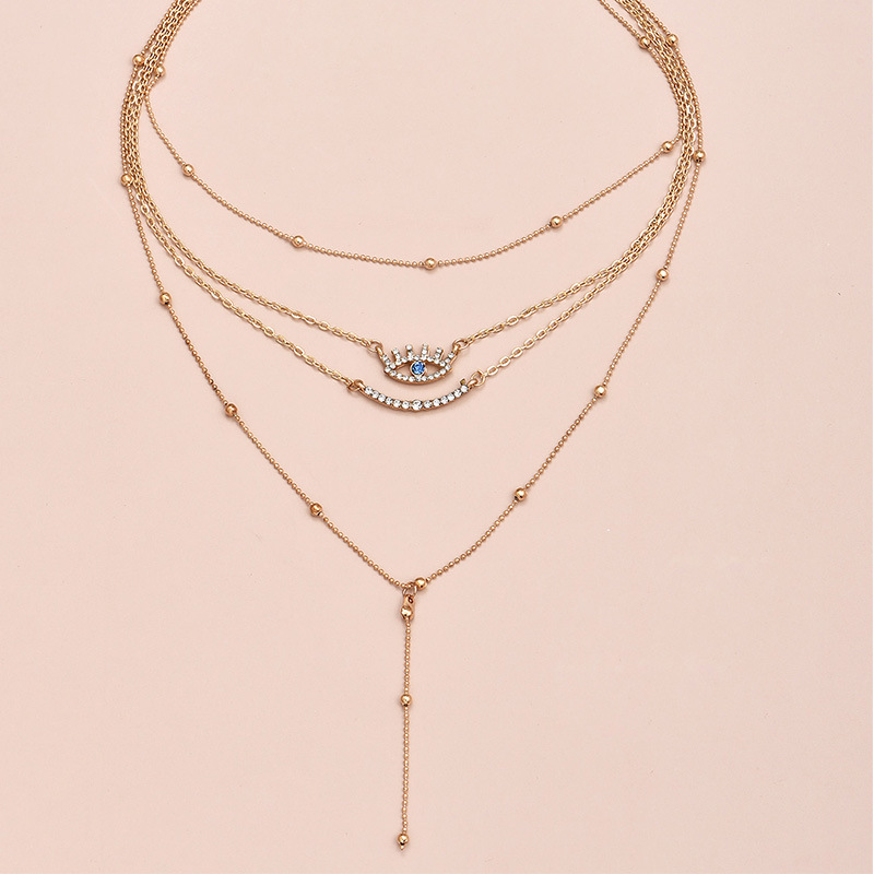 f0ceb782 bfed 4b02 b44a ab9786ee8552 Fashionable Personality Women's Full Diamond Five-pointed Star Eye Pendant Multi-layer Necklace