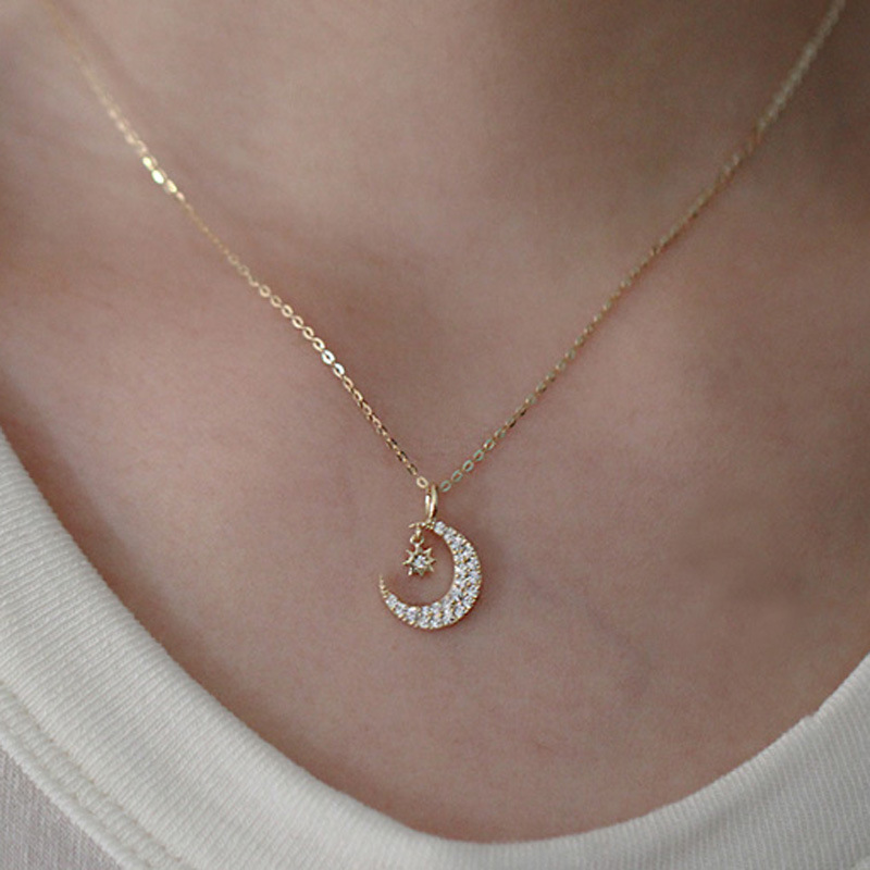 f6ae80c5 d02d 40e4 8625 c814d089383f Sterling Silver Gold Plated Star Moon Necklace Women's Delicate