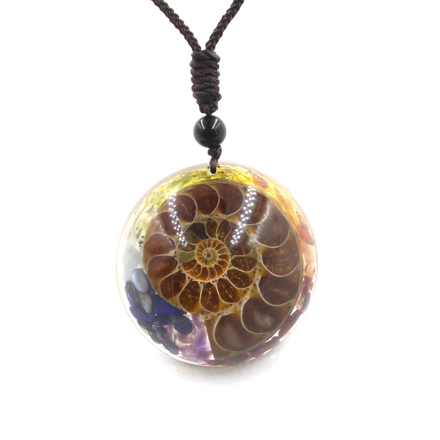 f80429fb 5b12 4df6 b34e 43ad76f083fa Resin And Crystal Fossil Snail Hemisphere Handicraft Pendant