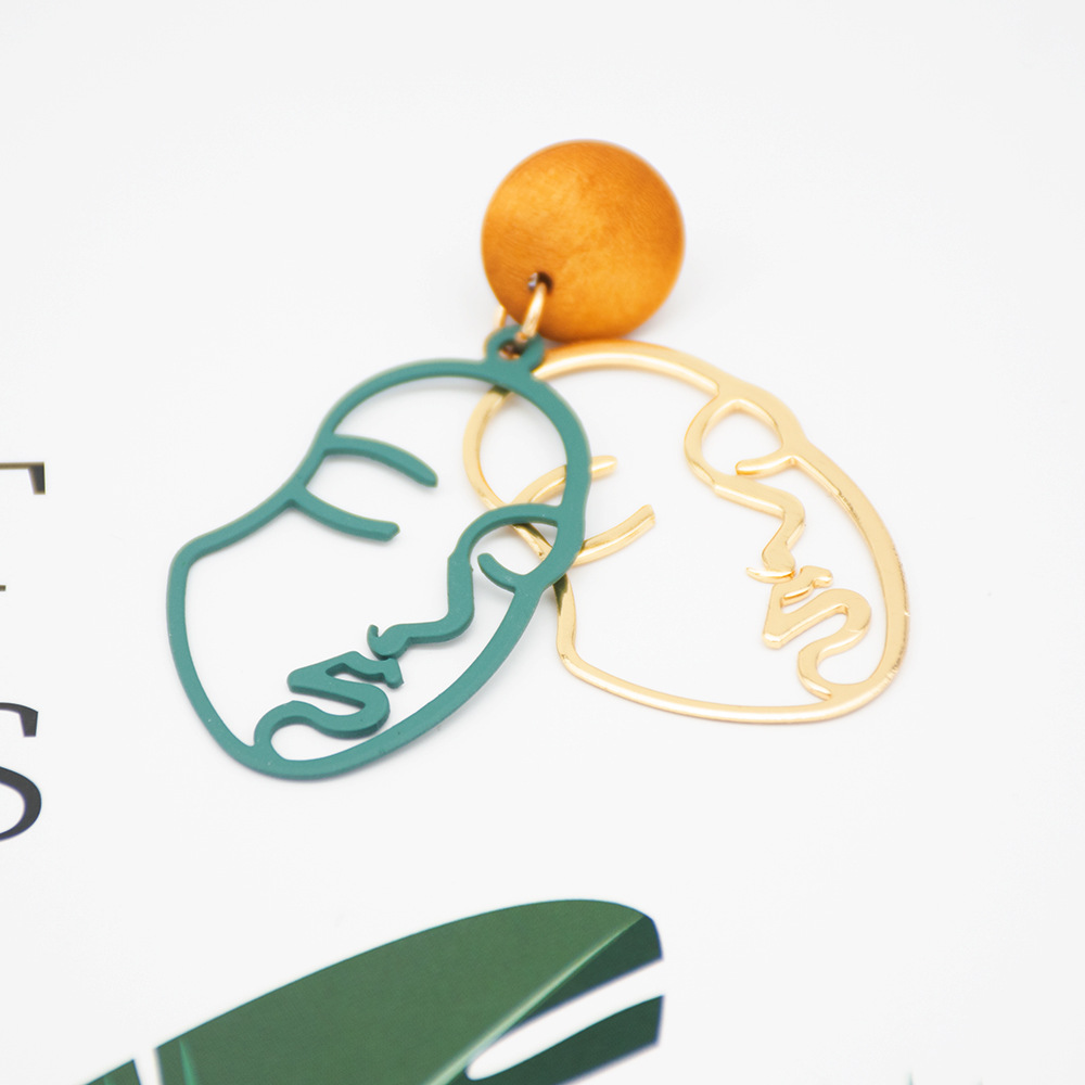 f90e99e4 af8f 458e b1de 7ed3b279dc65 Creative fashion Korean mask earrings