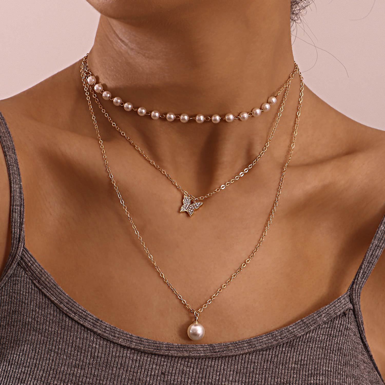 f9bba8bb 832b 4445 9a08 8895a96286bc Multilayer Thin Chain Pearl And Diamond Butterfly Pendant Necklace