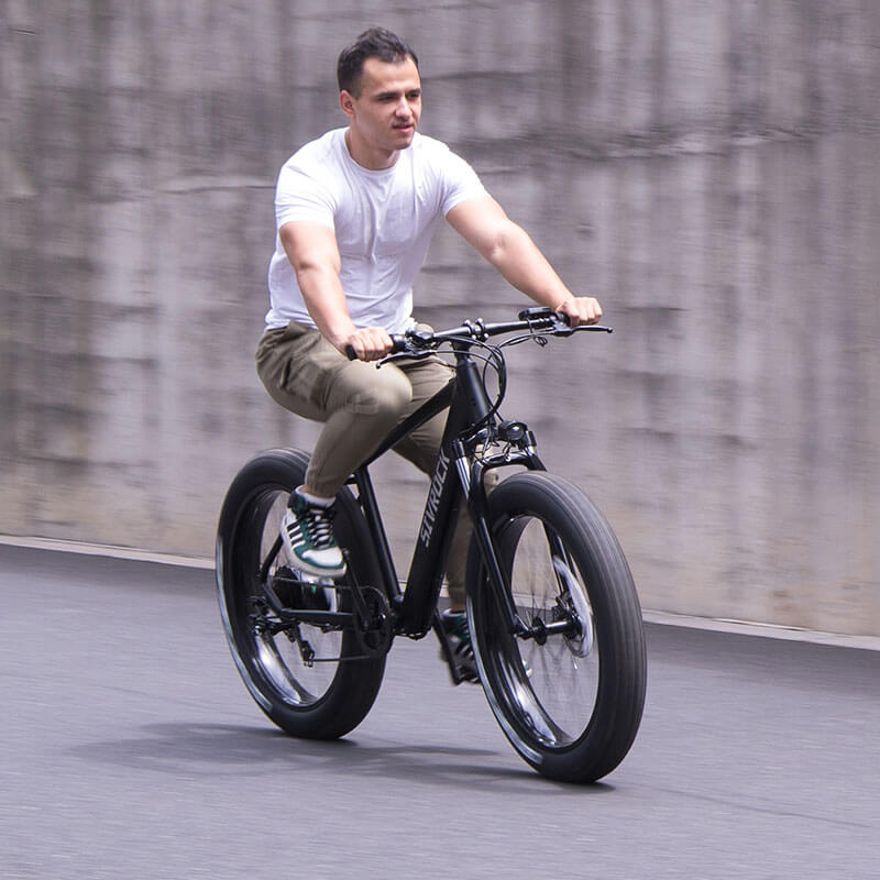 a man riding an ebike