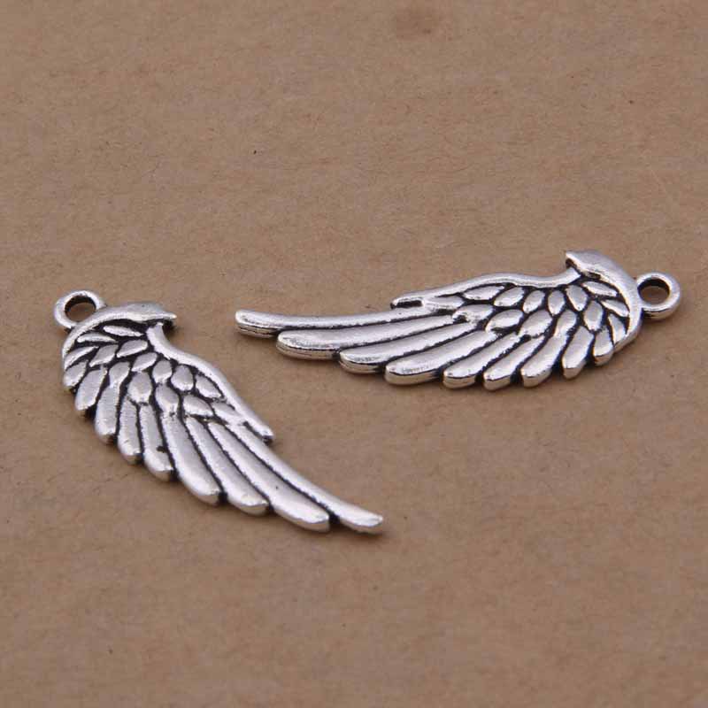 fe45382b 2d46 4fd0 9a28 749a51f98216 Antique Silver Double-sided Wings Small Pendant Jewelry Accessories